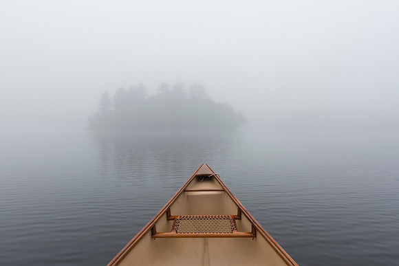 Canoe bow on a misty lake - Ontario, Canada