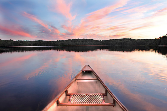 Canoe Bow on a Lake at Sunset